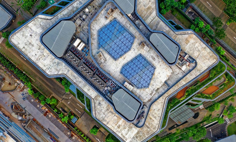 A stunning aerial view of a modern architectural building in Sindang Jaya, Indonesia, showcasing urban design.